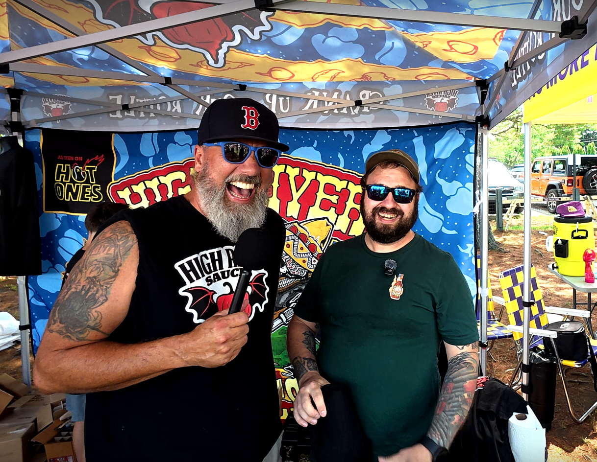 Matt interviewing Steve Seabury at a hot sauce festival booth